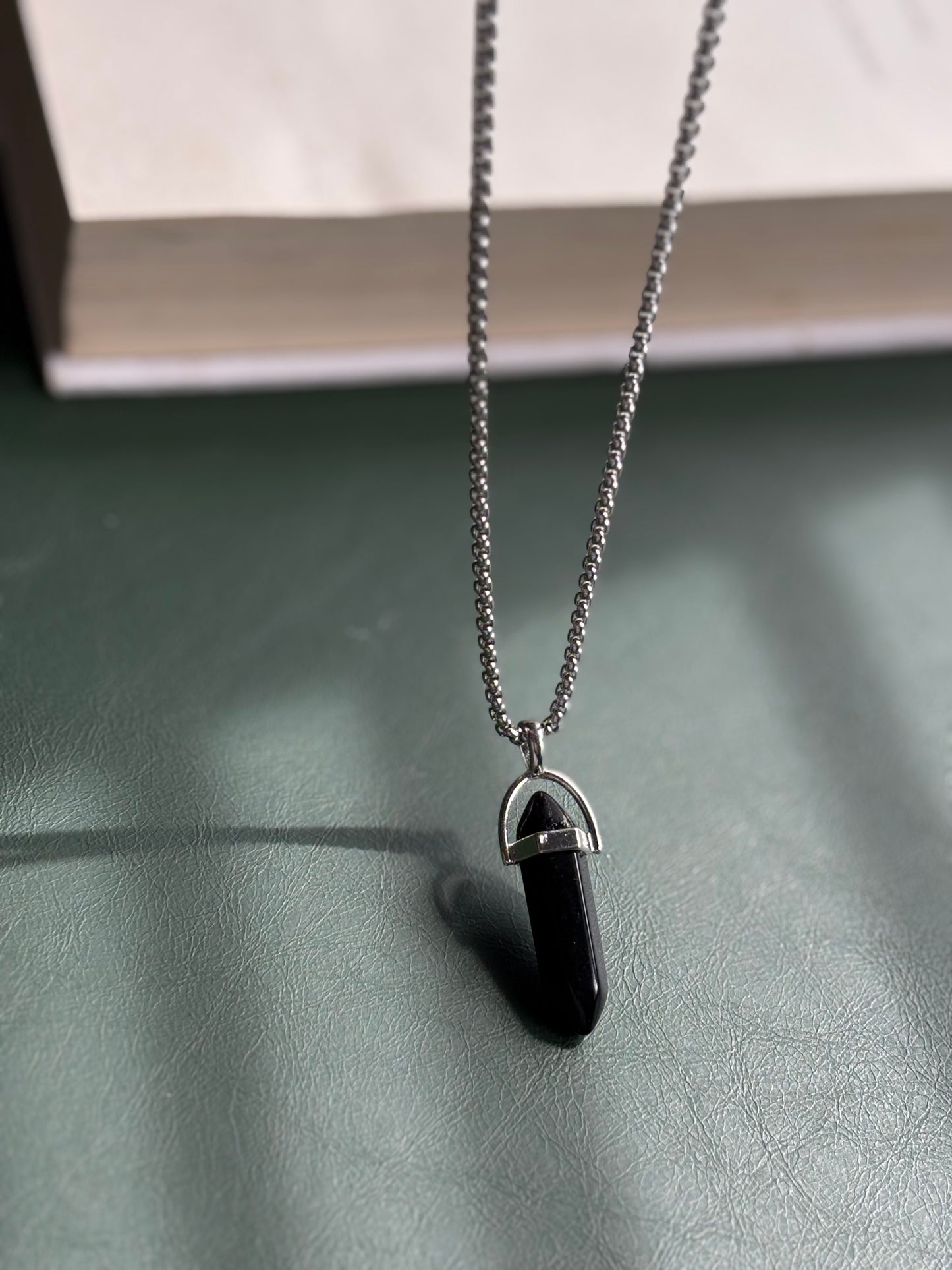 Black resin crystal pendent with chain