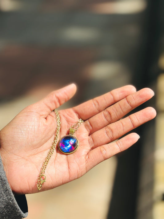 Glow in dark galaxy pendant