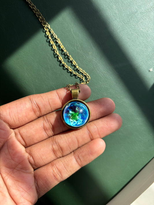 Earth glow in dark pendant