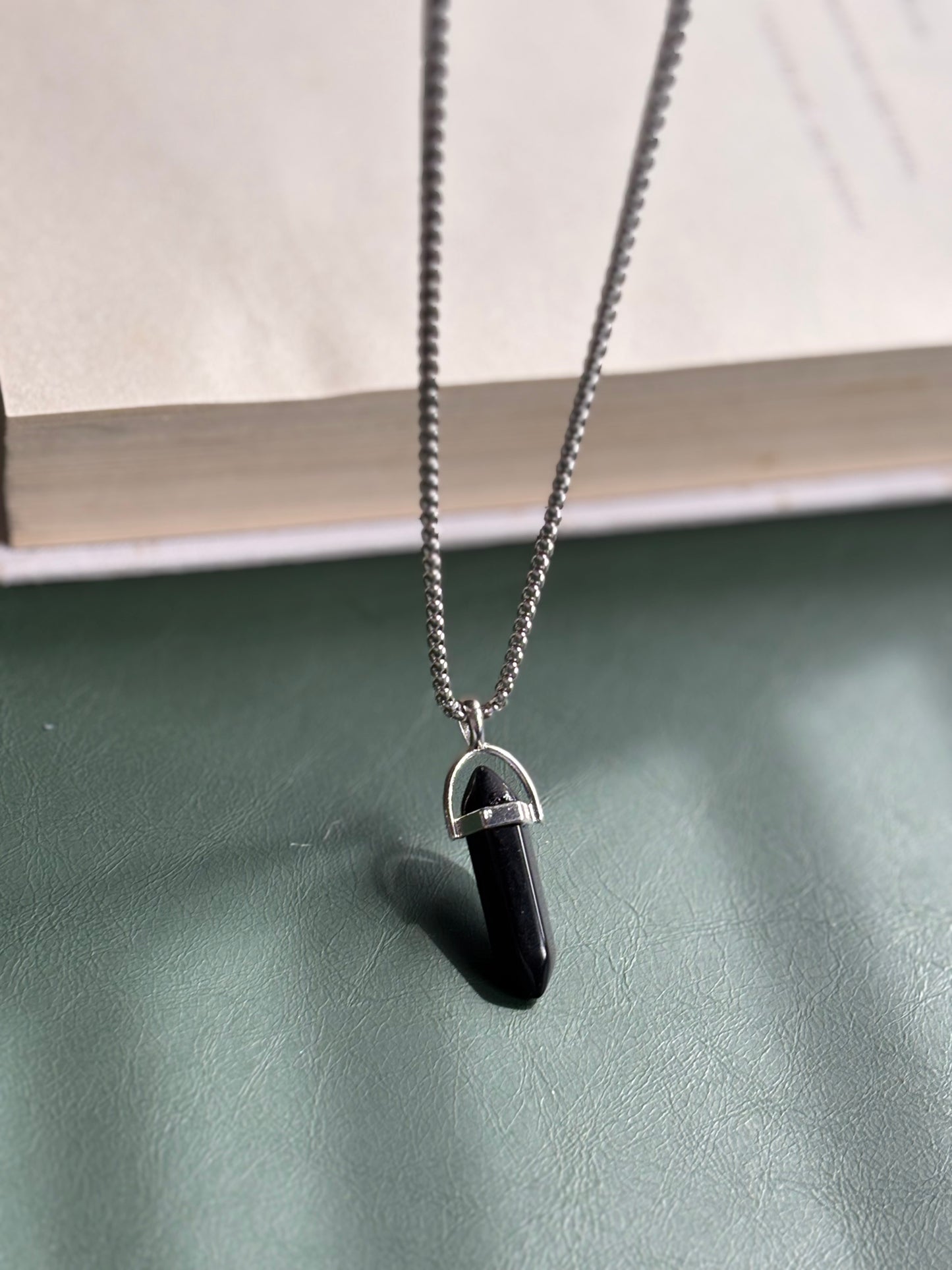 Black resin crystal pendent with chain