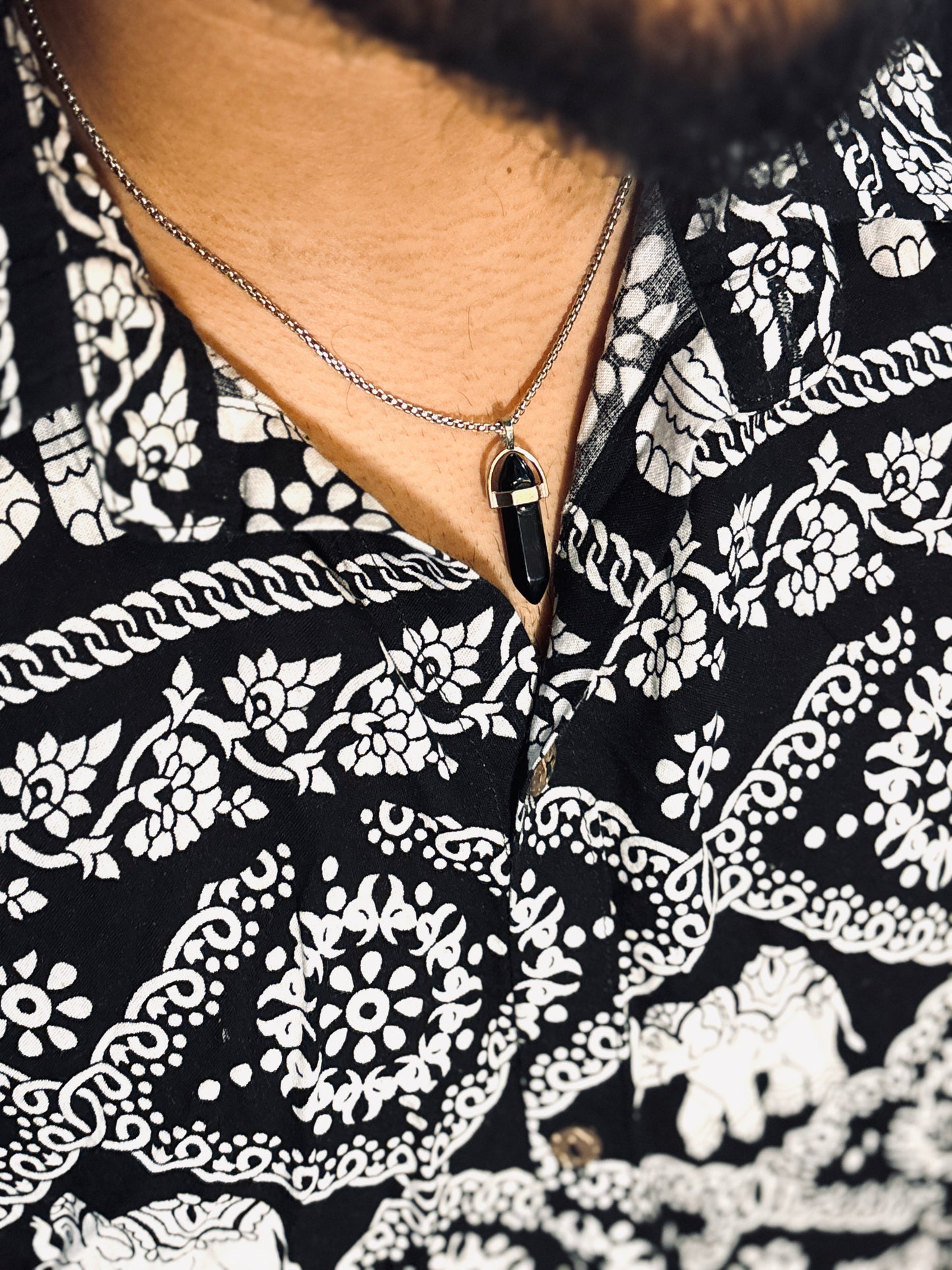 Black resin crystal pendent with chain