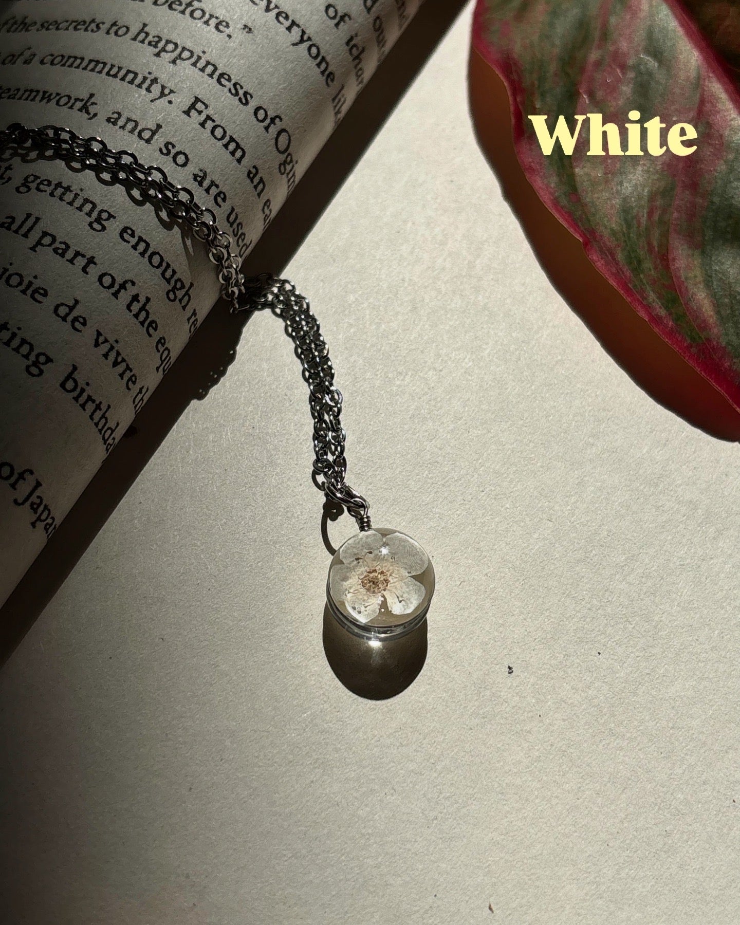 Plum flower pendant with chain