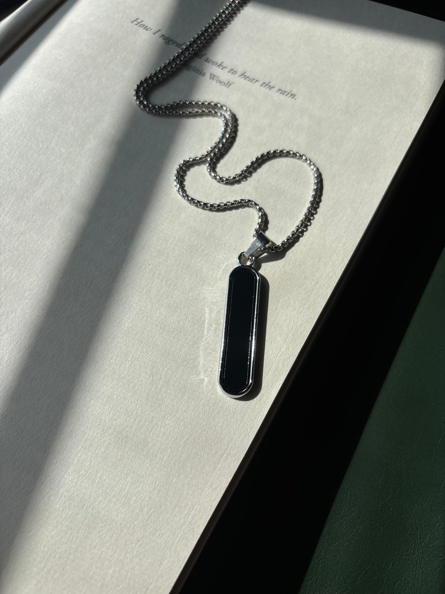 Black Stylish pendent with stainless steel chain