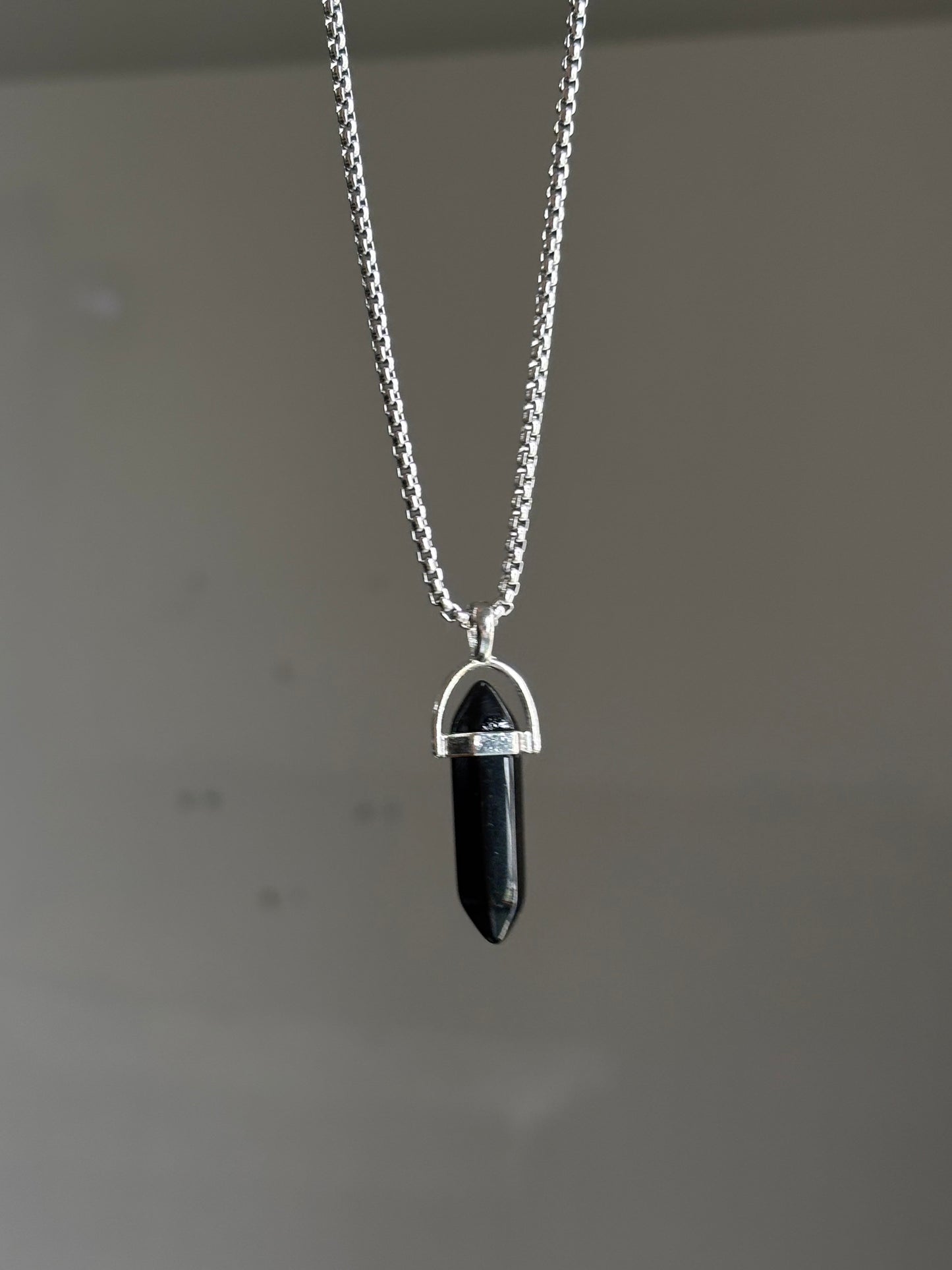 Black resin crystal pendent with chain
